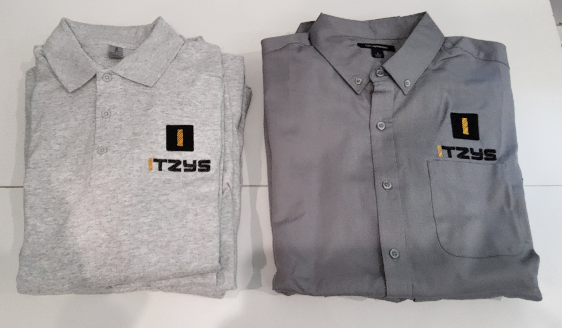 Itzys embroidered grey polo and grey work button-down shirt