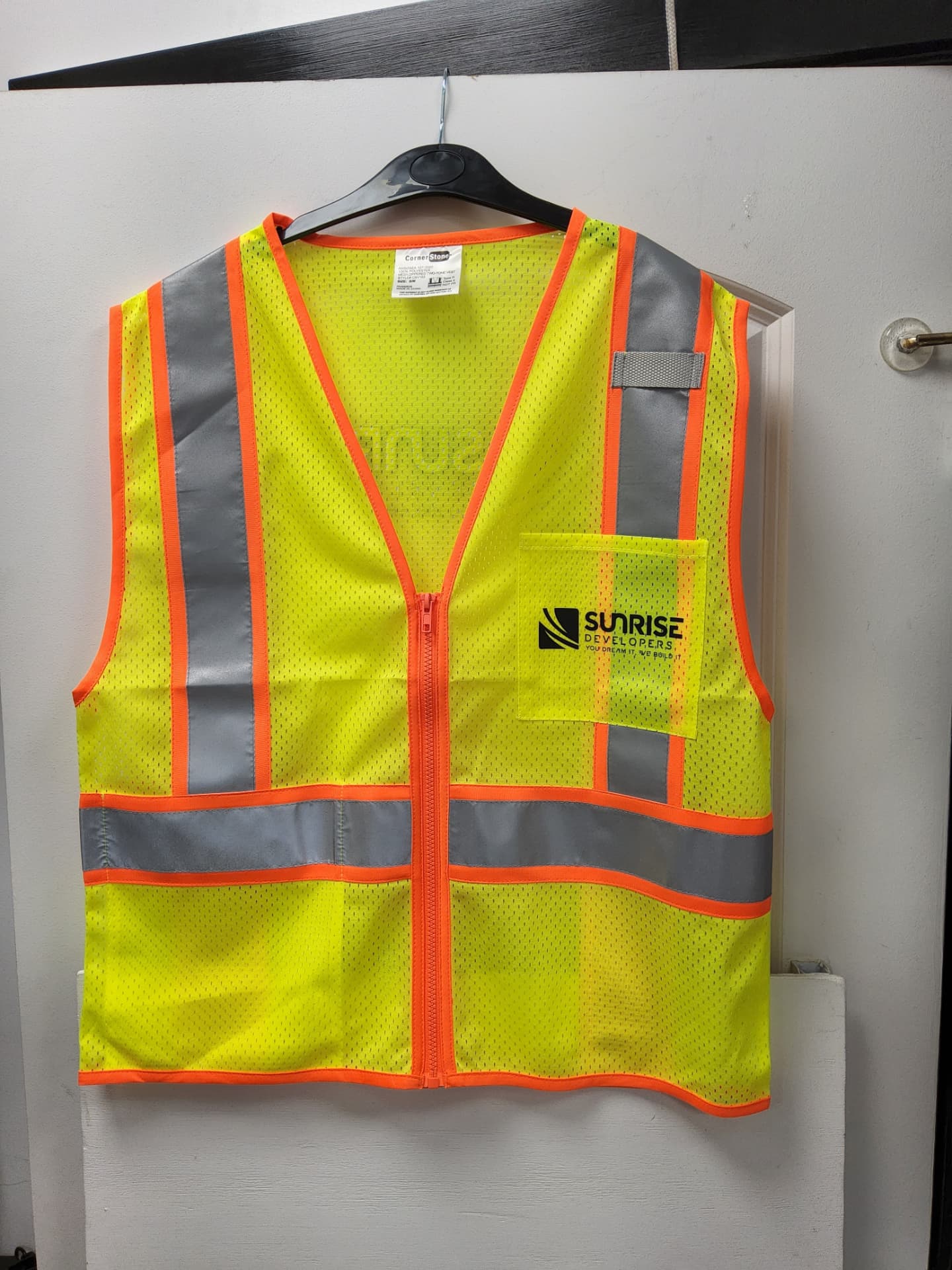 Sunrise Developers hi-vis safety vest with embroidered chest logo
