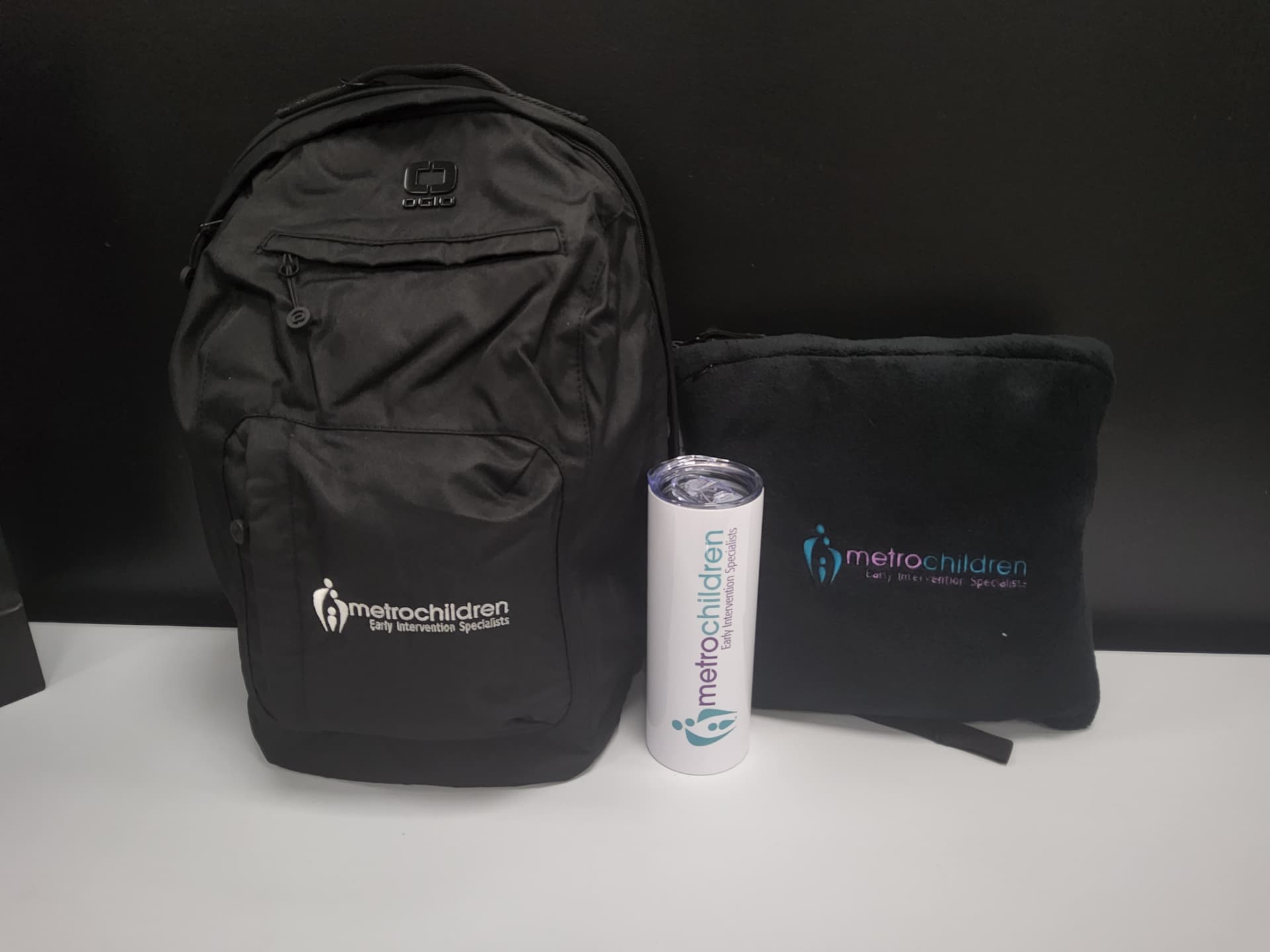 Metro Children employee gift set with embroidered backpack, fleece blanket and tumbler