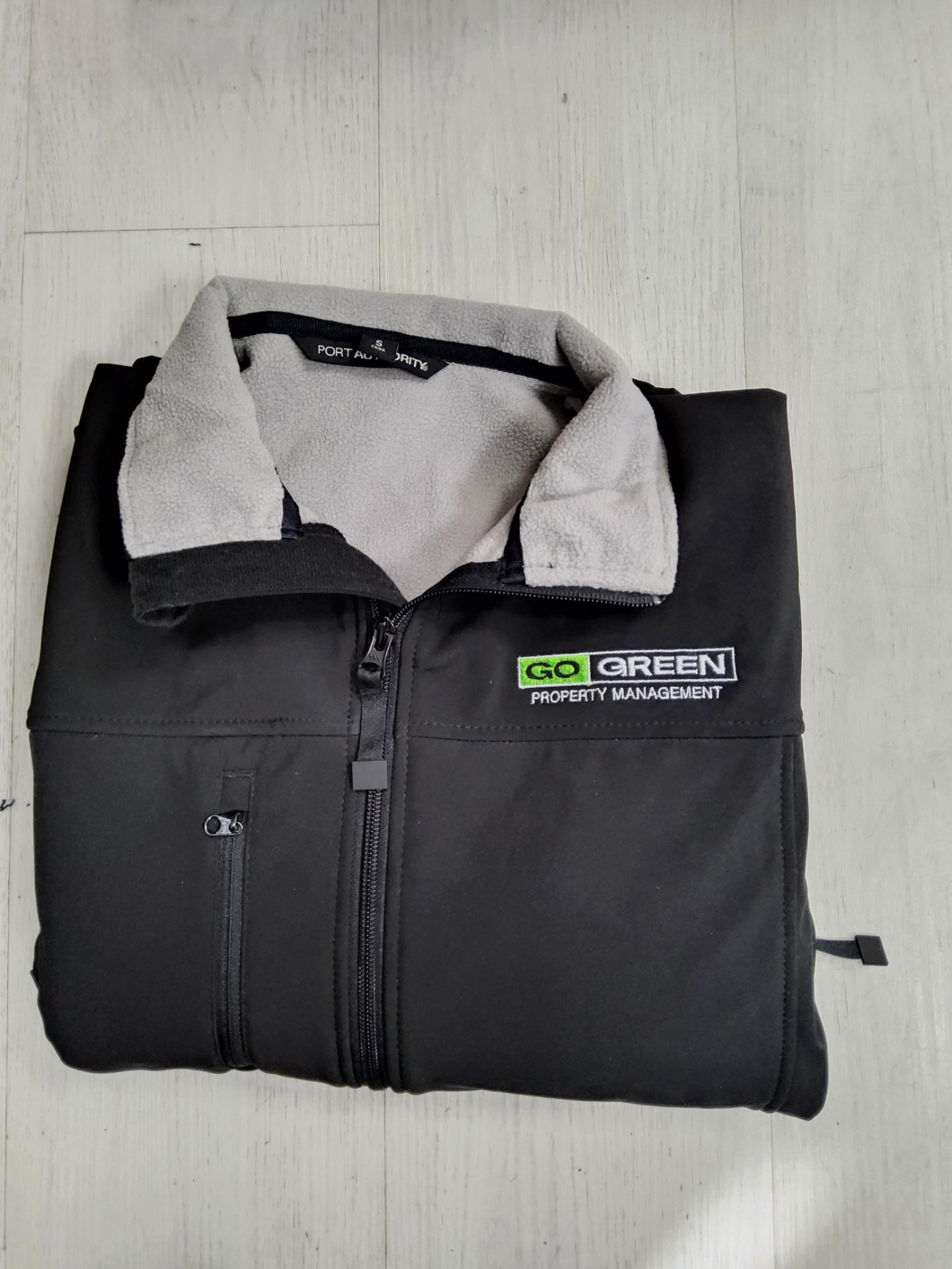 Go Green Property Management embroidered black fleece-lined soft shell jacket
