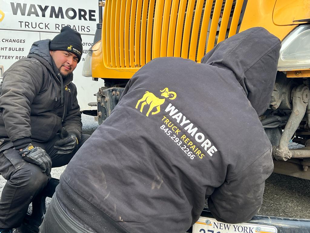 Waymore Truck Repairs crew hoodie with printed logo and phone number