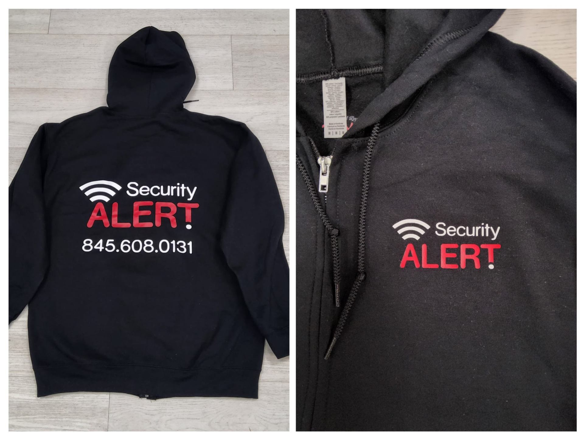 Custom printed hoodie with Security Alert branding and contact info